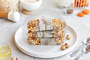 Homemade granola bars with pumpkin seeds and dried apricots