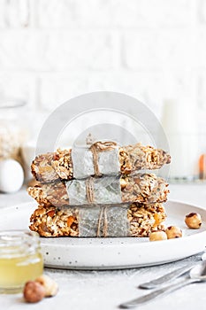 Homemade granola bars with pumpkin seeds and dried apricots
