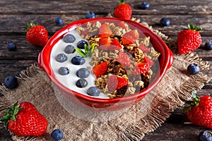 Homemade granola Breakfast with yogurt and fresh fruit berries. concepts health food