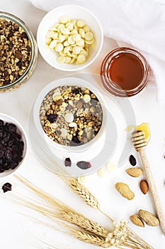 Homemade granola with fruits and white chocolate drops