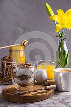 Homemade granola with nuts and dried fruit and chocolate for breakfast