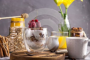 Homemade granola with nuts and dried fruit and chocolate for breakfast