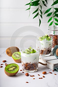 Homemade granola parfait with kiwi fruit