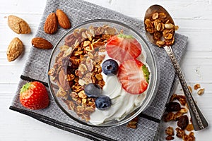 Homemade granola with yogurt and berries