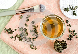 Homemade green tea face toner. Diy cosmetics recipe. Natural beauty treatment. Top view, copy space.