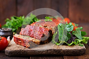 Homemade ground meatloaf with vegetables.