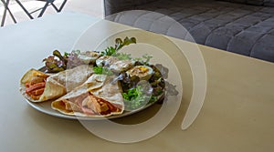 Homemade Ham and Chicken Kebab with vegetable salad and boiled egg