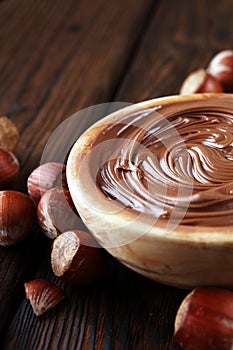 Homemade hazelnut spread in wooden bowl. Hazelnut Nougat cream