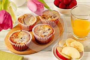 Homemade healthy oat muffins with various fruits