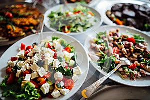 Homemade healthy salad buffet.Special occasion catering.Celebration dinner.Mediterranean seafood and octopus salad with onions,