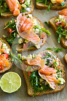 Homemade healthy sandwiches with salmon and avocado