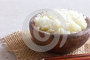 Homemade Healthy Vegetarian Cauliflower Rice in Wooden Bowl