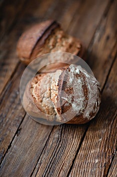 Homemade hearth bread on a wooden table.