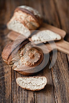 Homemade hearth bread on a wooden table.