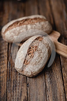 Homemade hearth bread on a wooden table.