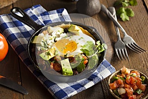 Homemade Heuvos Rancheros with Avocado photo