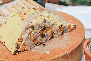 Homemade High fiber natural health food Sliced rye bread on cutting board. Whole grain rye bread with seeds