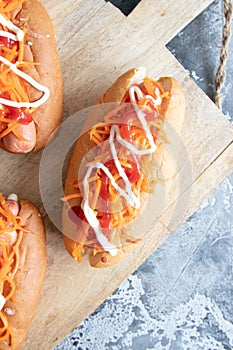 Homemade hot dogs with sausage and carrot