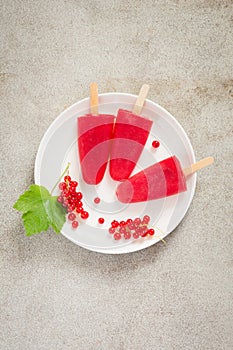 Homemade ice cream. Popsicles of red currant lemonade. Frozen drinks.