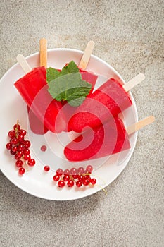 Homemade ice cream. Popsicles of red currant lemonade. Frozen drinks.