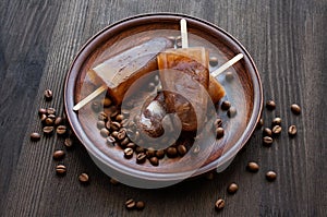 Homemade ice lolly with coffee beans