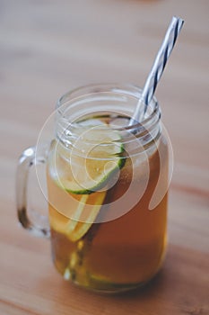 Homemade icetea with lemon and lime