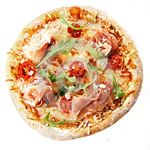 Homemade Italian pizza with parma ham and rocket