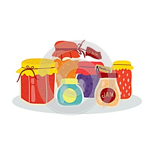 Homemade jam jars Glass jars with berry and fruit jam. Winter supplies. Autumn harvest season
