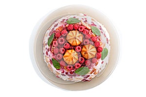 Homemade jelly cake with milk, cookies and raspberry isolated on white background. top view