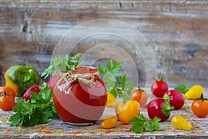 Homemade ketchup in a glass jar