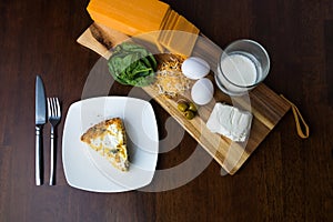 Homemade keto goat cheese and spinach pie. Close up above angle view