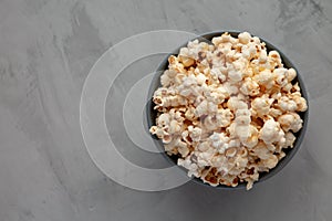Homemade Kettle Corn Popcorn with Salt in a Bowl, top view. Flat lay, overhead, from above. Copy space
