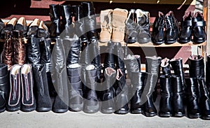 Homemade leather boots at a market