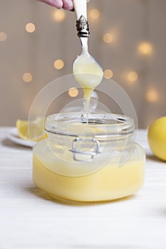 Homemade lemon curd. Lemon curd in a glass jar