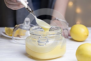 Homemade lemon curd. Lemon curd in a glass jar