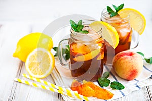 Homemade lemonade with ripe peaches and fresh mint. Fresh peach