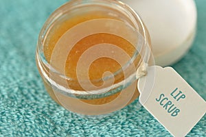 Homemade lip scrub made out of brown sugar, honey and olive oil