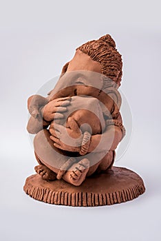 Homemade lord Ganesha idol or Ganapati Bappa murti using dissolvable clay