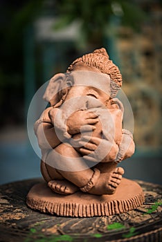 Homemade lord Ganesha idol or Ganapati Bappa murti using dissolvable clay