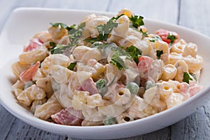 Homemade macaroni salad with vegetables