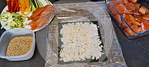 Homemade Maki rolls en preparation first step