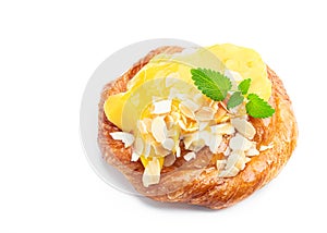 Homemade mango puff pastry bun isolated on white