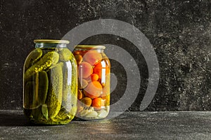 homemade marinades on dark background, copy space