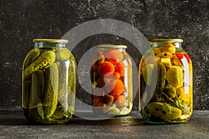 homemade marinades on a dark background in glass