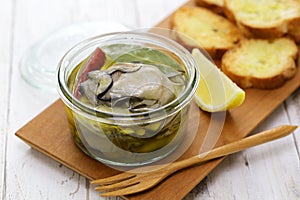 homemade marinated oysters in olive oil