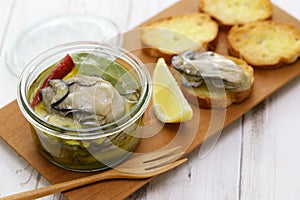 homemade marinated oysters in olive oil