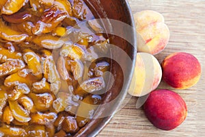 Homemade marmalade or jam processing from apricotes or peaches