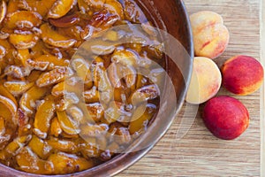 Homemade marmalade or jam processing from apricotes or peaches