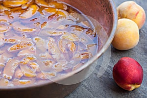 Homemade marmalade or jam processing from apricotes or peaches