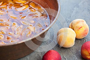 Homemade marmalade or jam processing from apricotes or peaches